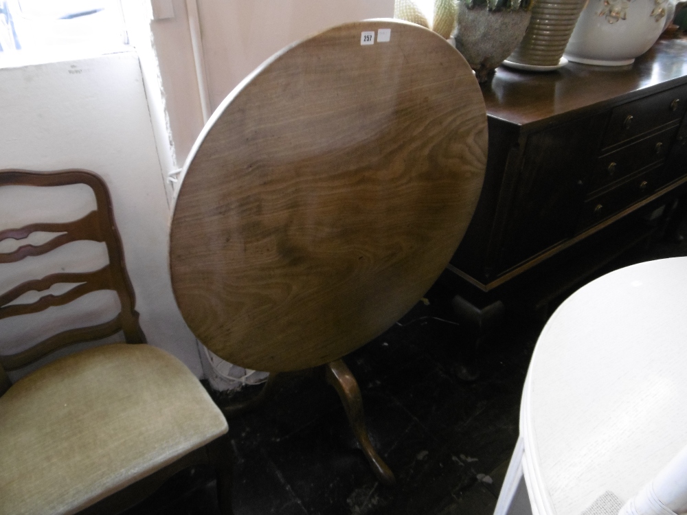 A late Victorian tilt top table,