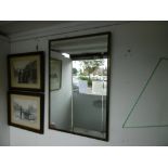 A brass framed mirror