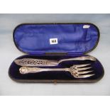 A pair of cased Victorian silver fish servers,