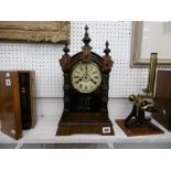 An oak mantle clock