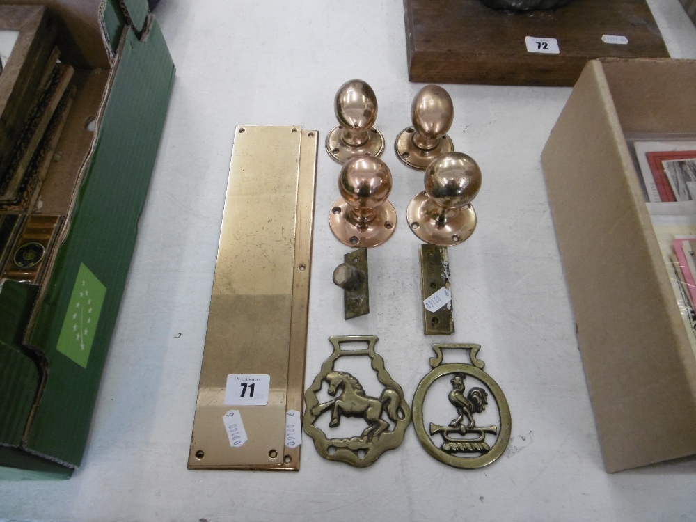 A quantity of brass door furniture
