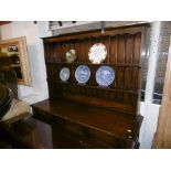 AN OAK DRESSER (CIRCA 1920) STAMPED MAPLES ON BACK, 152X190CM APPROX.