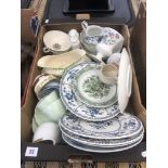 A box of assorted chinaware