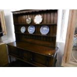 AN OAK DRESSER (CIRCA 1920) STAMPED MAPLES ON BACK, 152X190CM APPROX.