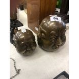 Two brass Buddha one large and one small