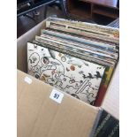 An assortment of records including David Bowie & Beatles