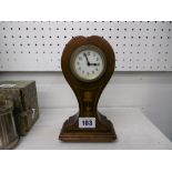 A small inlaid Edwardian mahogany tulip clock