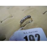 A 9ct gold half eternity ring,