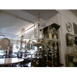 A five branch crystal drop chandelier and pair of two arm wall sconces a/f