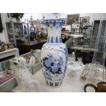 An oriental blue and white vase height 65cm
