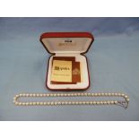 A Majorca pearl necklace with silver clasp in its original box