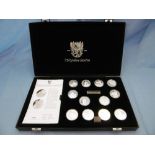 A cased set of twenty five silver coins