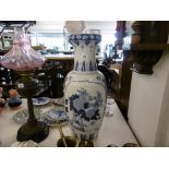 An oriental blue and white vase height 65cm