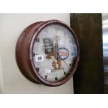 A repro metal advertising clock (Essex)