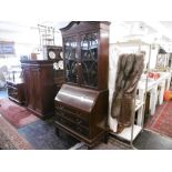 A mahogany bureau bookcase