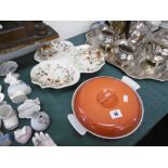 A decorative three division dish and a metal dish with cover