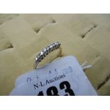 A 9ct gold half eternity ring,