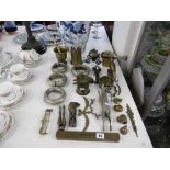 A mixed assortment of metal ware including spirit level