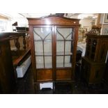 An Edwardian mahogany display cabinet