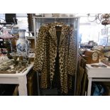 A leopard skin coat