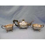 A Celtic design hallmarked silver three piece tea service Birmingham 1935