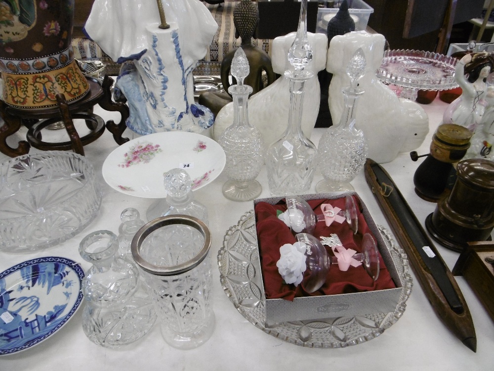 A quantity of decanters and other glassware