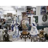 A pair of blue and white capodimonte figural table lamps in form of classical figures both damaged