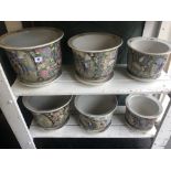 Two three piece Canton planter sets