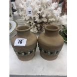 A pair of Doulton Lambeth silicon ware vases