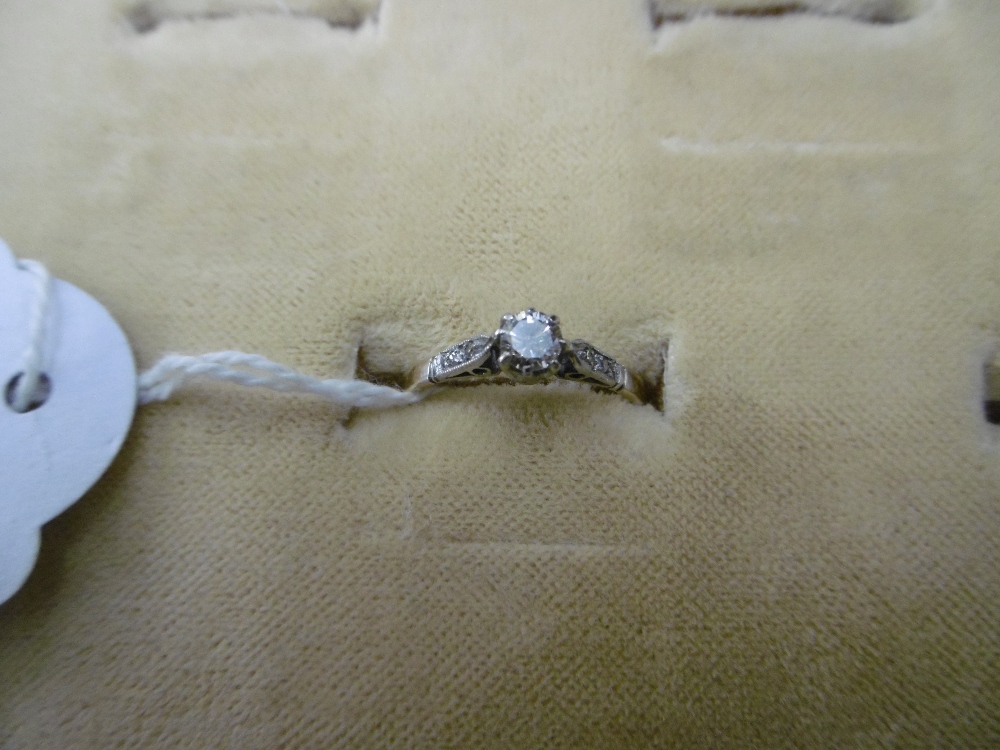 An 18ct gold diamond and solitaire ring with diamond shoulders, - Image 9 of 10