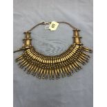An ethnic necklace
