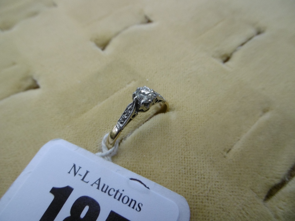 An 18ct gold diamond and solitaire ring with diamond shoulders, - Image 3 of 10