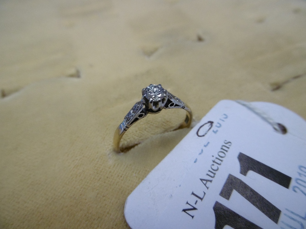 An 18ct gold diamond and solitaire ring with diamond shoulders, - Image 2 of 10