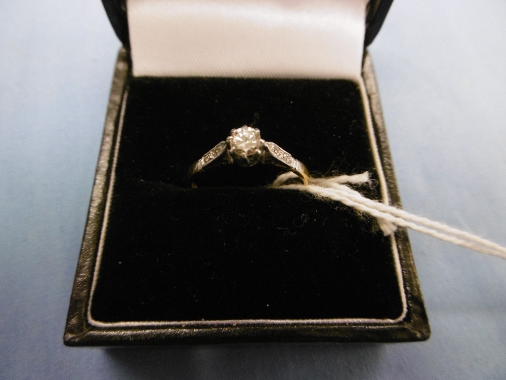 An 18ct gold diamond and solitaire ring with diamond shoulders, - Image 8 of 10