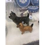Three dog figures including Beswick