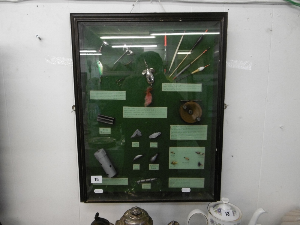 A framed fishing diorama