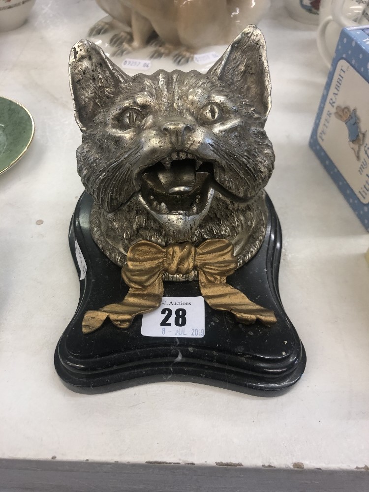 A bronze silvered cats hat inkwell