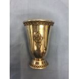 A hallmarked silver beaker