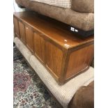 A retro style teak blanket box