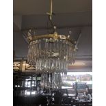 A brass and crystal chandelier