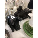 A carved wood pig a/f and a Chinese carved wood ox with figure