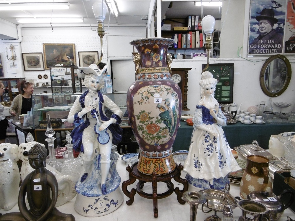 A pair of blue and white capodimonte figural table lamps in form of classical figures both damaged