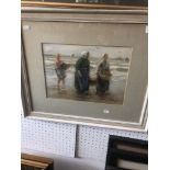 A framed signed watercolour of cockle pickers