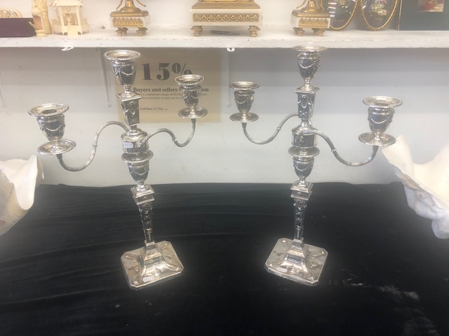 A pair of hallmarked silver candleabras, one candlearbra weighs at 1.725kg and other 1. - Image 2 of 17