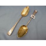 A pair of hallmarked silver berry table spoons London 1806 weight 118 grams