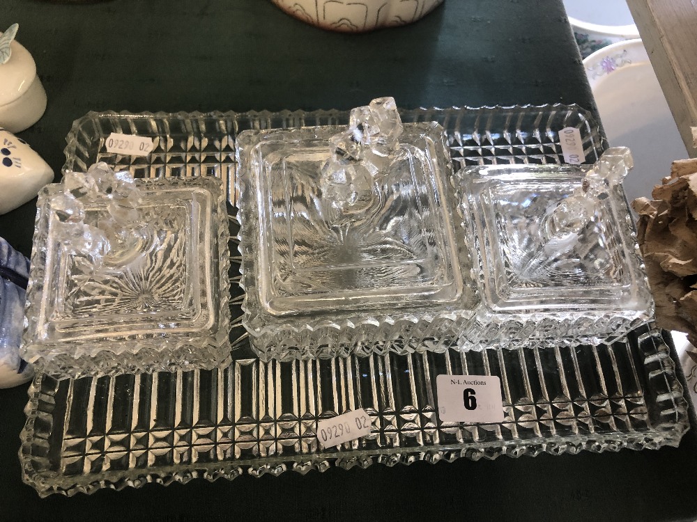 An art deco cut glass dressing table set