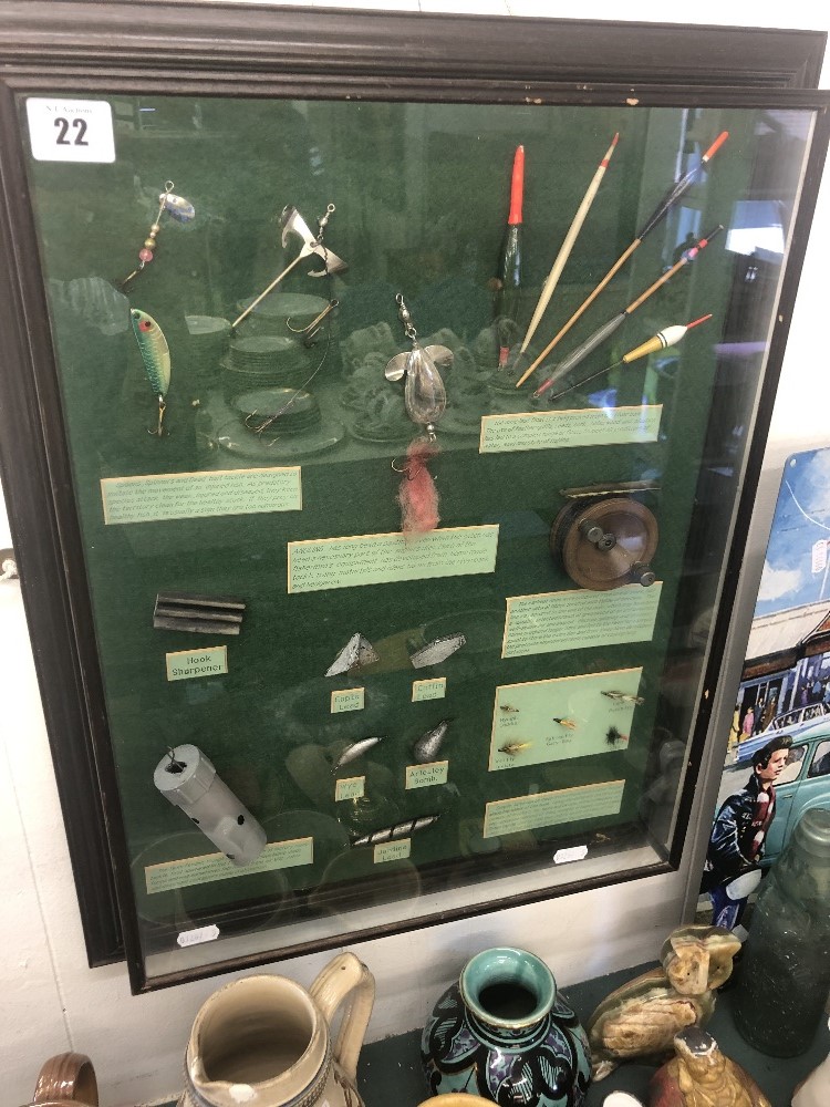 A framed fishing diorama
