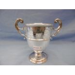 A hallmarked silver trophy weight 202 grams