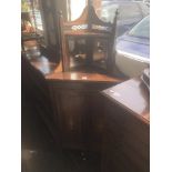 A 19th century rosewood corner cabinet