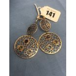 A pair of gemstone set 14ct gold earrings